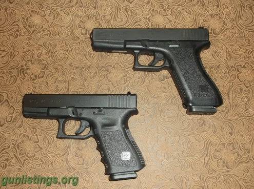 Pistols 2 Glock 22 & 23 Hand Guns