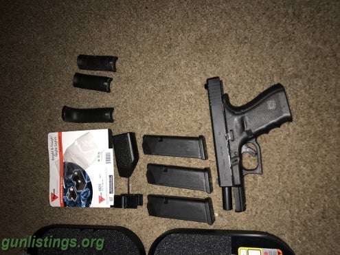 Pistols Glock 23 4th Gen W/Night Sights Ammo, Holster, And Safe