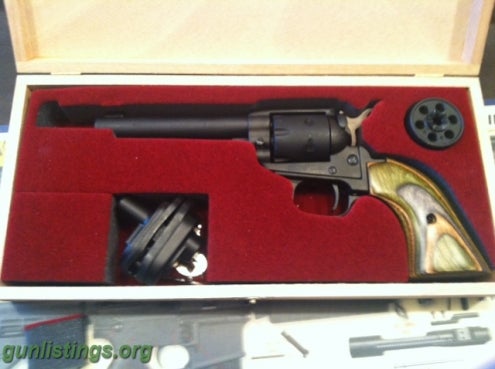 Pistols NIB Heritage Arms 22lr And 22mag.