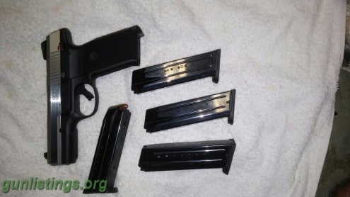 Pistols NIB Ruger SR9 And 4 Magazines