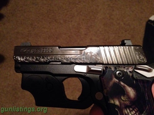 Pistols SIG SAUER P938 WITH LASER AND ENGRAVING ON THE SLIDE .