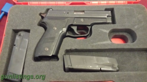 Pistols Sig Sauer P229 .40 Cal Handgun W/extra Mag, Case. Cable