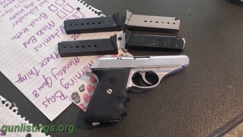 Pistols Sig Sauer P230SL With 4 Mags And Hogue Grips.