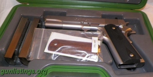 Pistols REMINGTON R1 !911 LIKE NEW WITH BOX AND PAPERS STAINLES