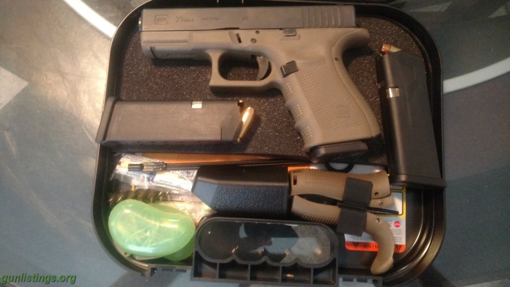 Pistols Glock 23 Gen 4  .40 Call. With 500 Rounds Of Ammo.