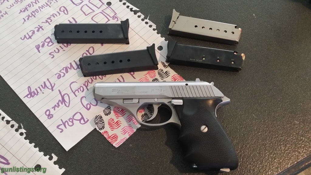 Pistols Sig Sauer P230SL With 4 Mags And Hogue Grips.