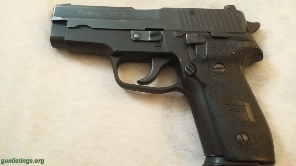 Pistols Sig P228