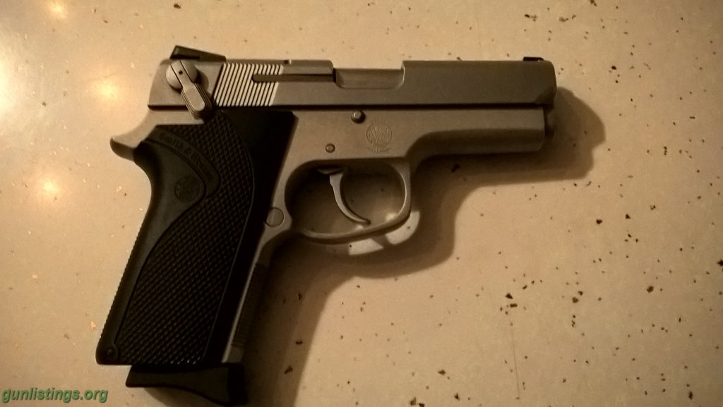 Pistols S&W 3919 Stainless