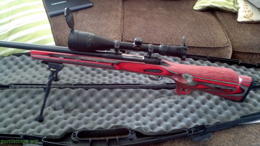 Rifles For Sale: Savage Model 12 Red Laminate Thumbhole Stock