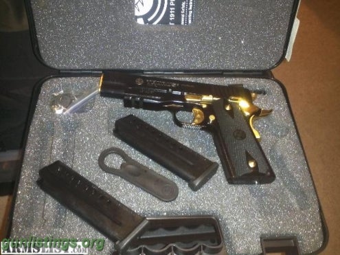1911 38 super taurus with gold accents in yakima washington gun