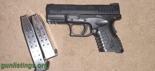 Pistols Springfield XD(M)  40 CAL.  3.8 COMPACT