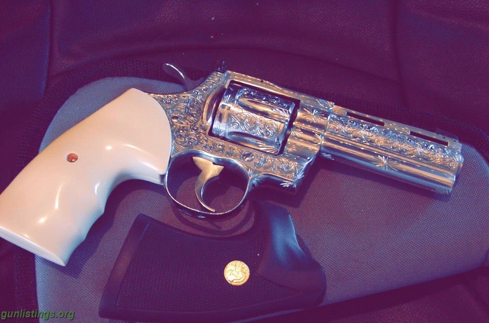 Pistols Colt Python 4''stainless Handgun