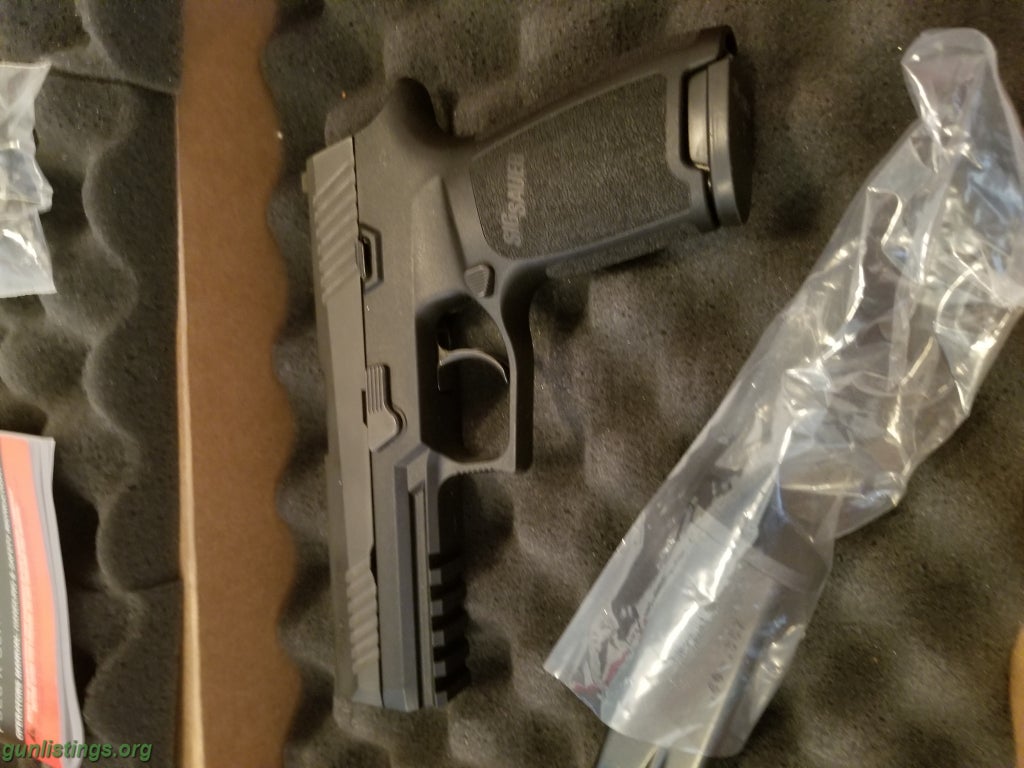 Pistols Sig P 320 In 40 Cal Unfired And Excellent Condition