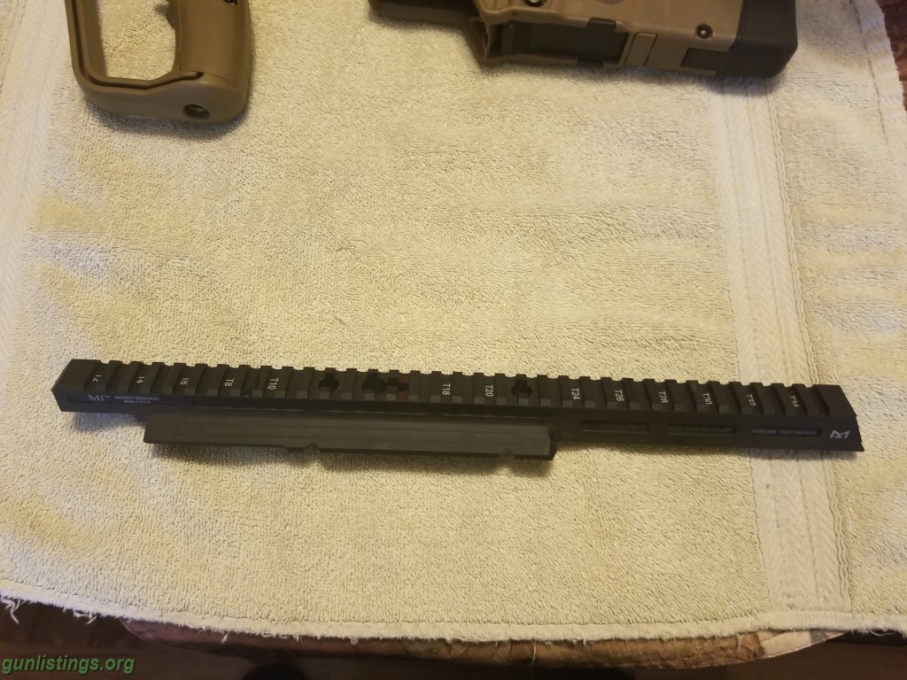 Gunlistings rifles iwi tavor x95 extended rail by midwest industries