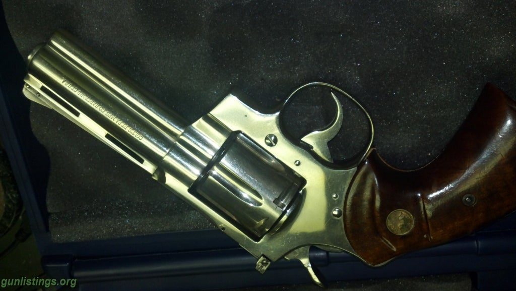 Gunlistings.org - Pistols Colt Python 4in Nickle In Case