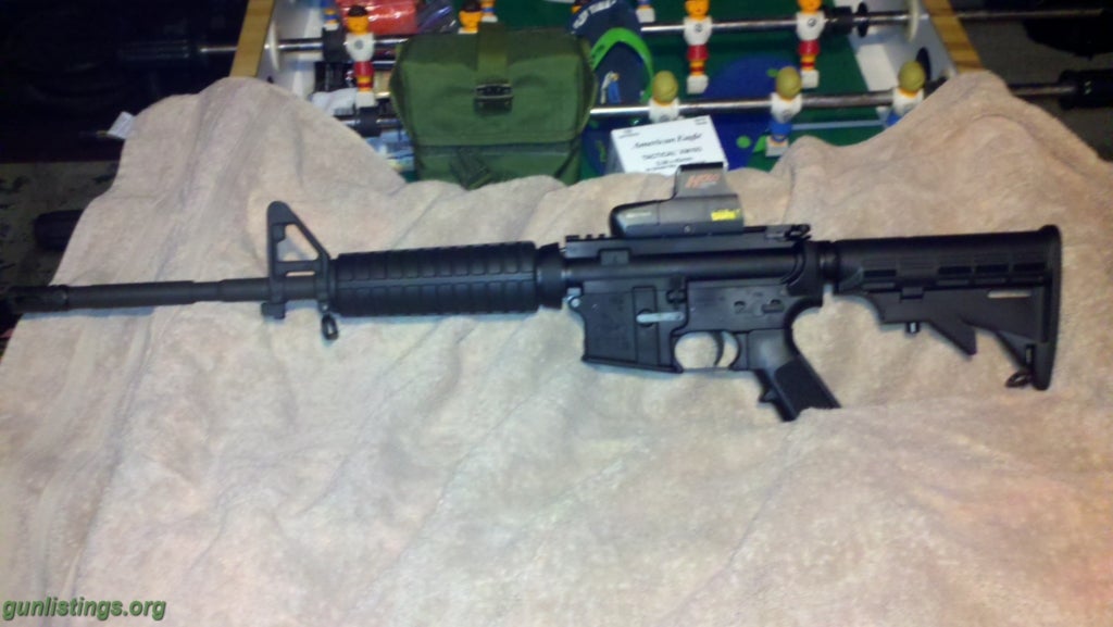 Rifles Bushmaster AR-15 223/556 With Eotech